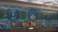 Image of The Ghan train with Aboriginal artwork dot painting