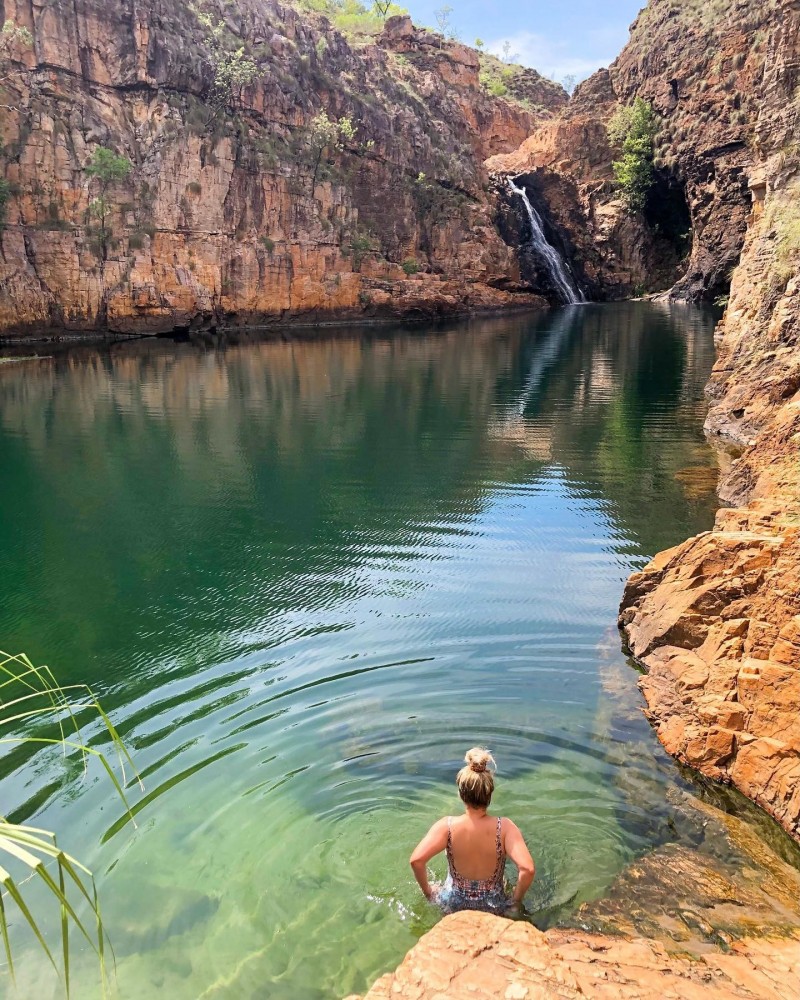 woman-overlooking-waterfall