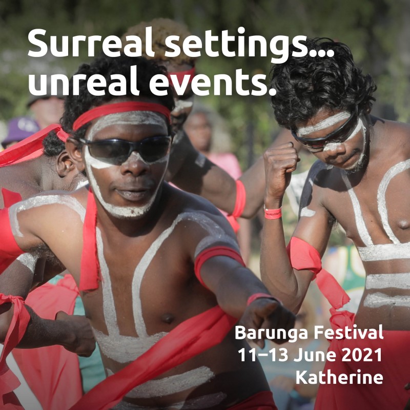 Aboriginals men in ceremonial dress dancing